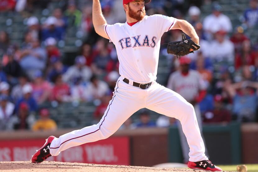 Texas Rangers relief pitcher Sam Dyson (47) pitches during the ninth inning against the Los...