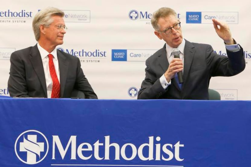 
Stephen Mansfield (left), CEO of Dallas-based Methodist Health System, and David Hayes,...