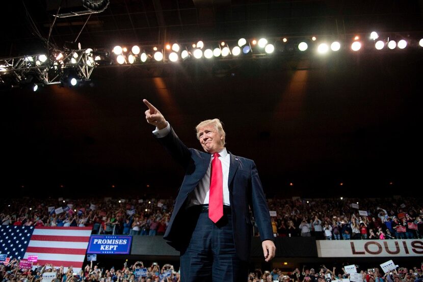 President Donald Trump arrives for a 'Make America Great Again' rally at the Kentucky...