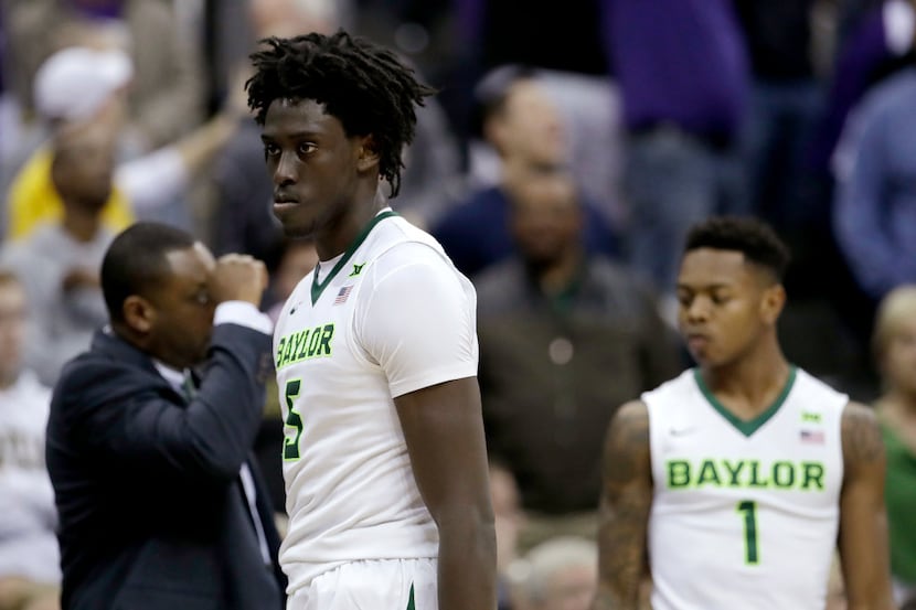 Baylor's Johnathan Motley (5) walks off the court after fouling out during the second half...