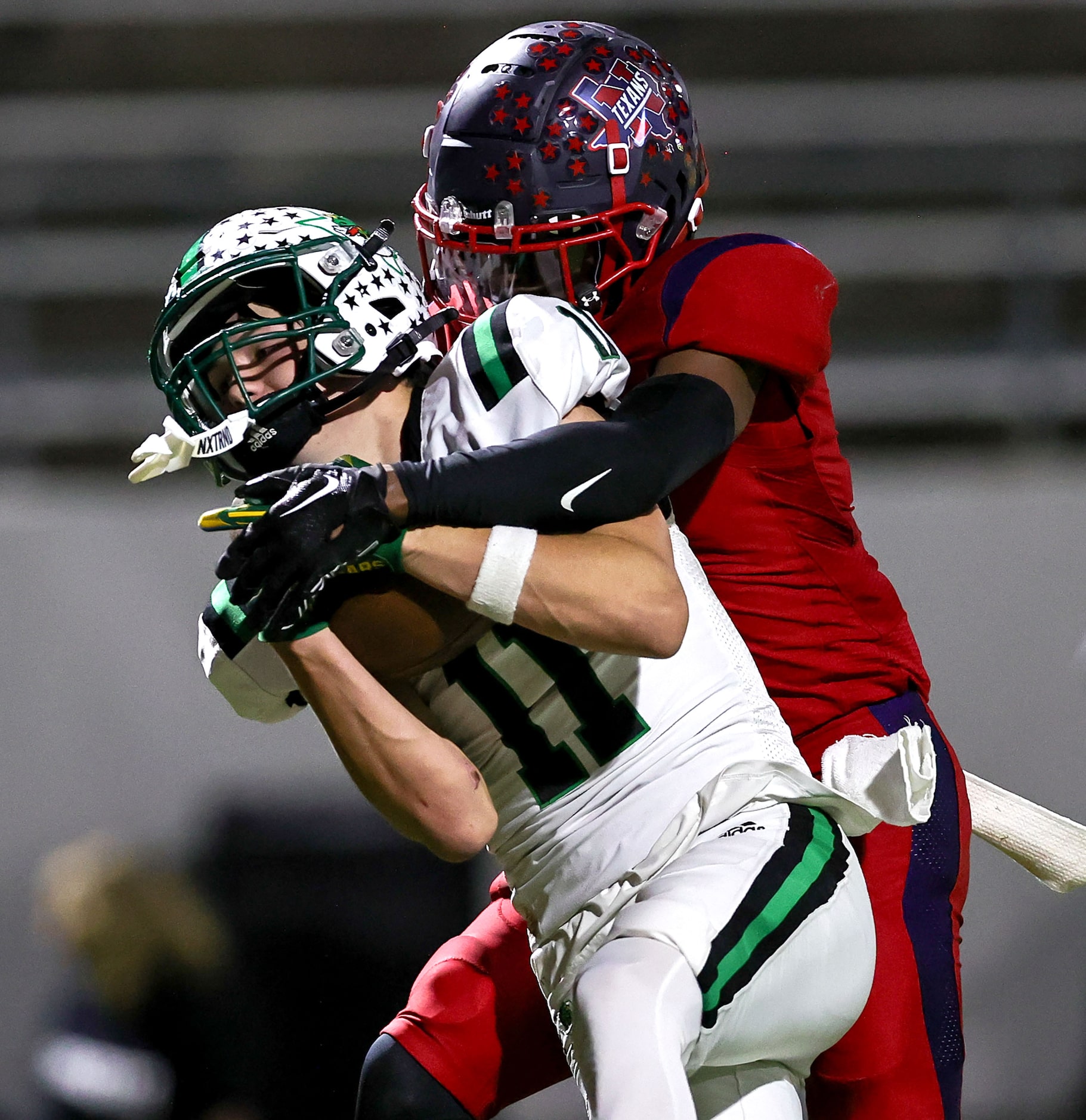 Southlake Carroll wide receiver Brock Boyd (11) comes up with a 44 yard touchdown reception...