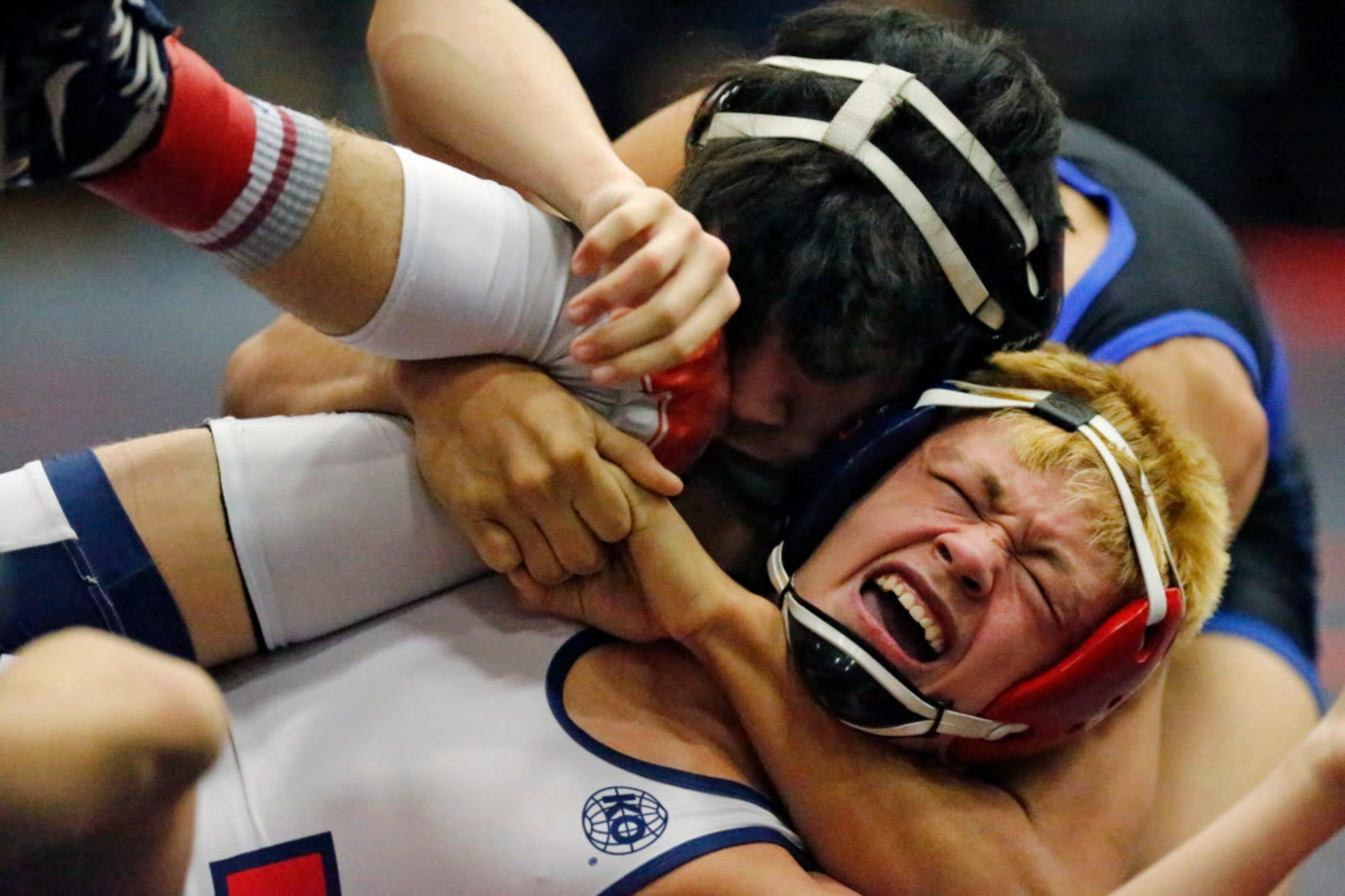 Felix Saunders (top) of Midlothian High School went on to defeat Landon Brown of Northwest...