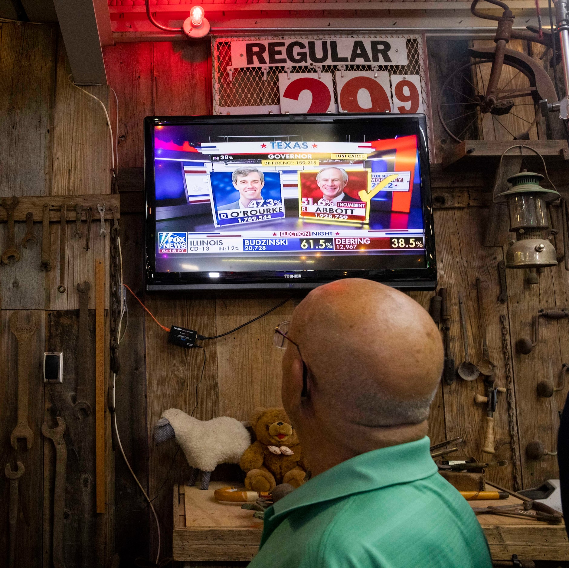 A TV tuned to Fox News shows Governor Greg Abbott as the winner over Democratic challenger...