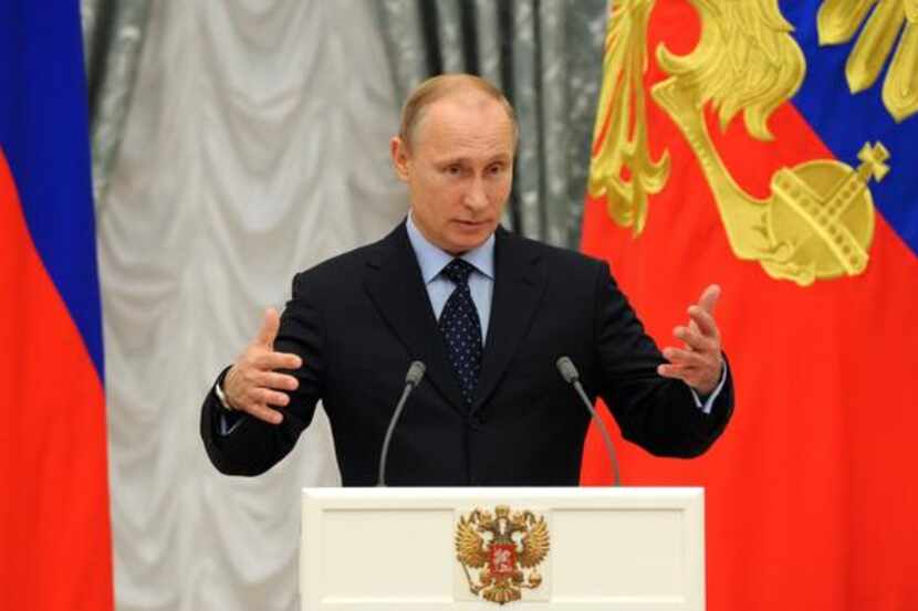 
Russia's President Vladimir Putin speaks at the Kremlin in Moscow Tuesday.
