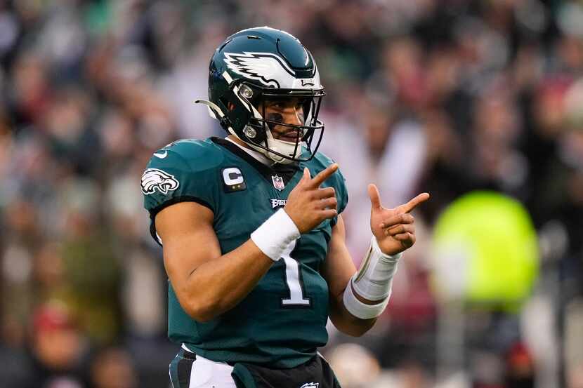Philadelphia Eagles quarterback Jalen Hurts gestures during the first half of the NFC...