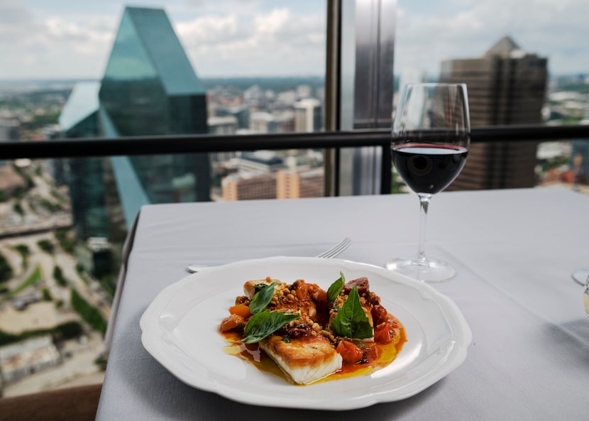 Roasted Halibut with tomato and olive sauce from Chef Eric Dreyer at Monarch restaurant in...