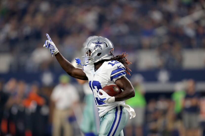 Dallas Cowboys wide receiver Lucky Whitehead (13) celebrates his touchdown against the...