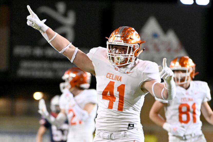 Celina's Hunter Neely (41) celebrates after blocking a punt in the first half of a Class 4A...