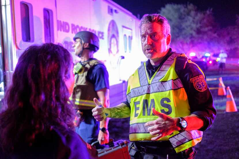 Captain Matt Clark, right, and Chief Deputy Medical Director Dr. Heidi Abraham, left, of...