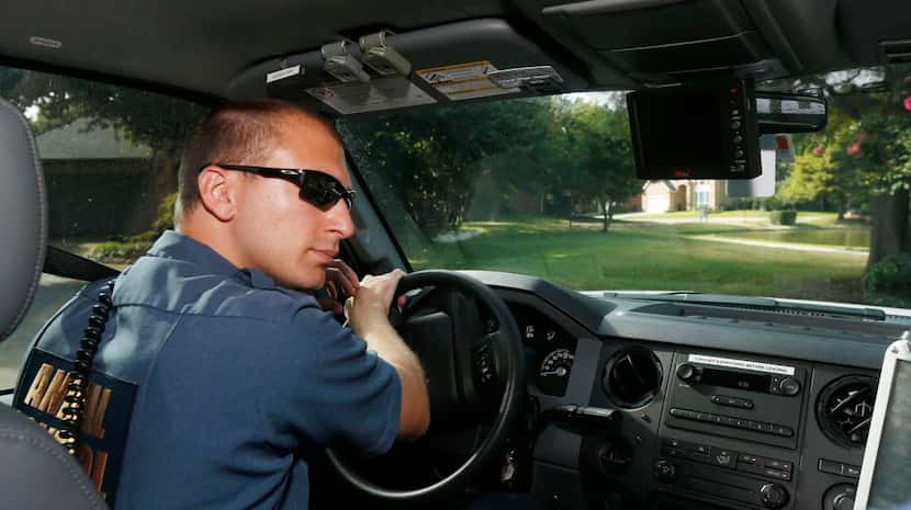 
Addison Animal Control Officer Ryan Wies drives the new animal control truck as he makes...