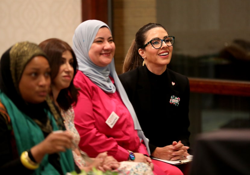 Founder Dyma AbuOleim, right, during a November meeting of the Dallas chapter of 200 Muslim...