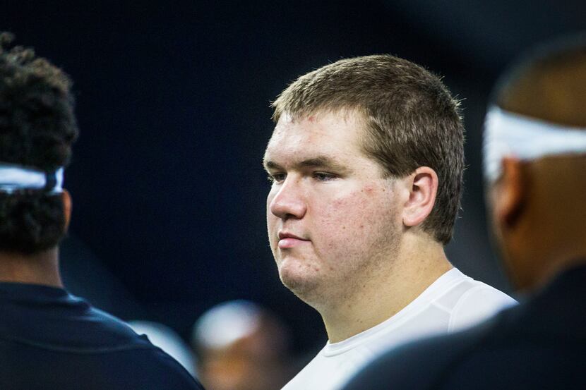 Crandall offensive lineman Branson Bragg waits in line to run a drill during the second day...