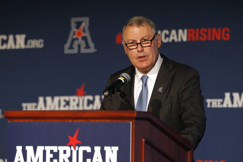 FILE - In this Aug. 4, 2015 file photo, American Athletic Conference commissioner Mike...
