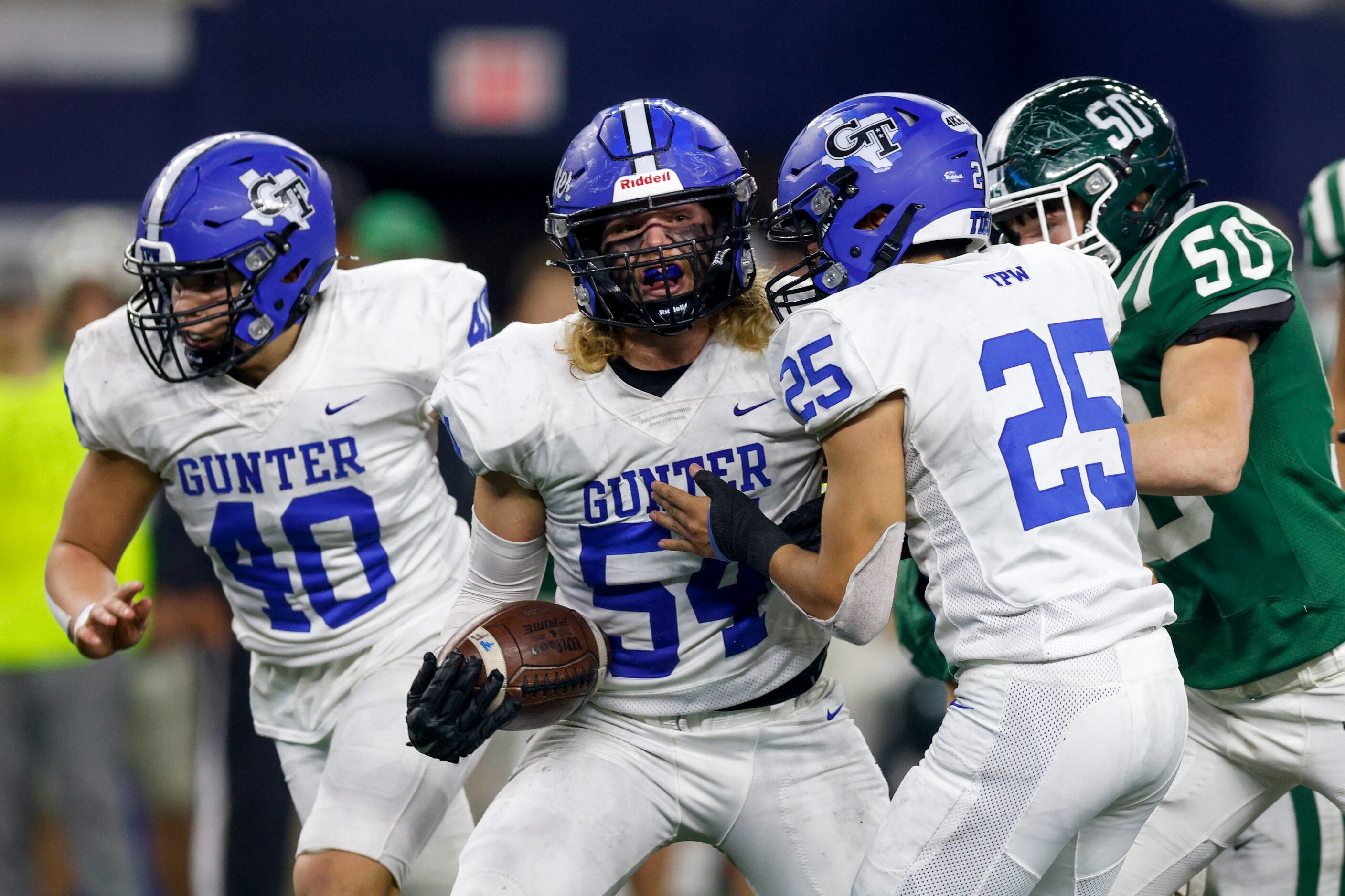 Gunter defensive lineman Lane Dophied (54) returns a recovered a forced fumble during the...