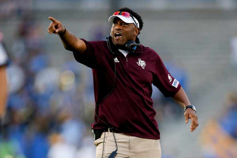 FILE - In this Sunday, Sept. 3, 2017, file photo, Texas A&M head coach Kevin Sumlin gestures...