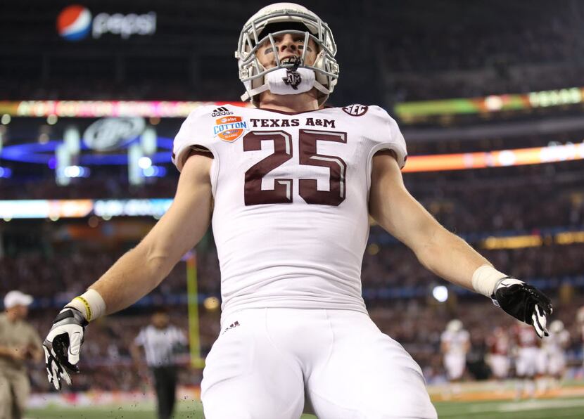 Texas A&M Aggies wide receiver Ryan Swope (25) celebrates as he runs in for a touchdown...