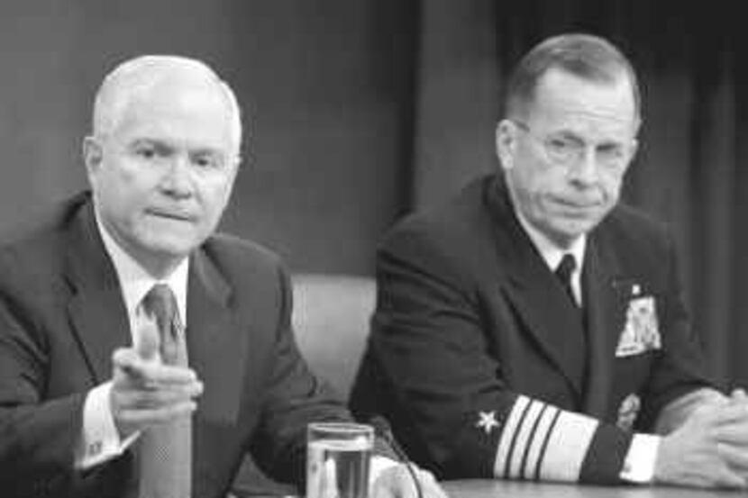  Defense Secretary Robert Gates, with Adm. Mike Mullen, chairman of the Joint Chiefs of...