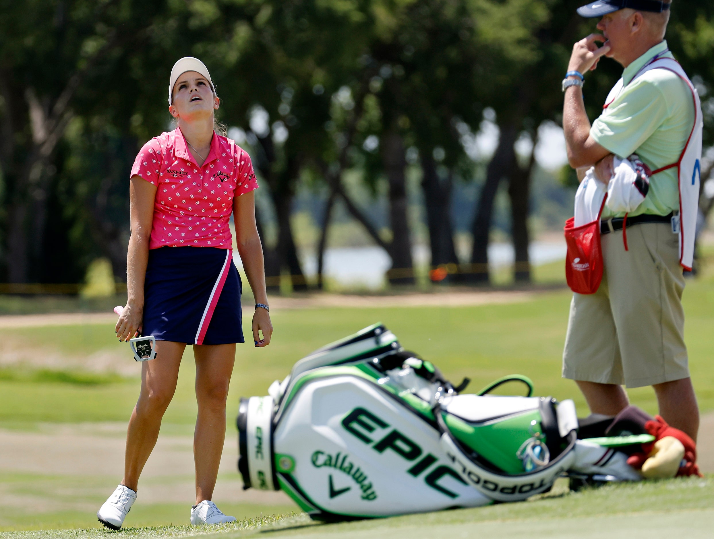 Professional golfer Katelyn Dambaugh reacts to her birdie putt attempt on No. 17 during the...