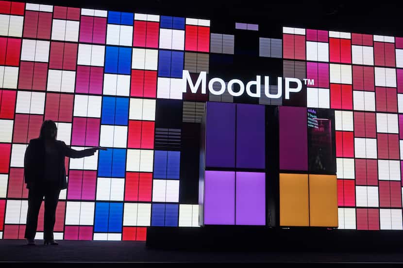 LG MoodUP refrigerators with customizable LED color panels are displayed at the LG...