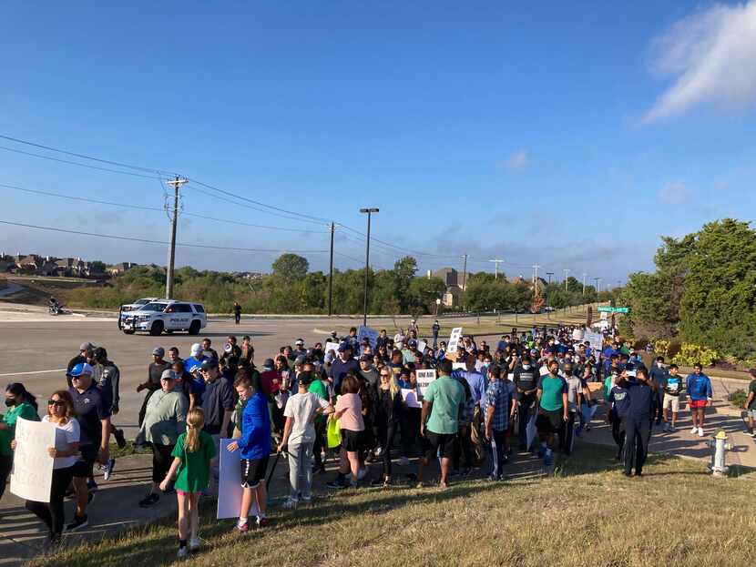 Community members on Oct. 23 protest Frisco ISD's proposed zoning map for the 2022-23 school...