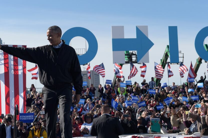 President Barack Obama arrives to speak at a campaign rally for Democratic presidential...