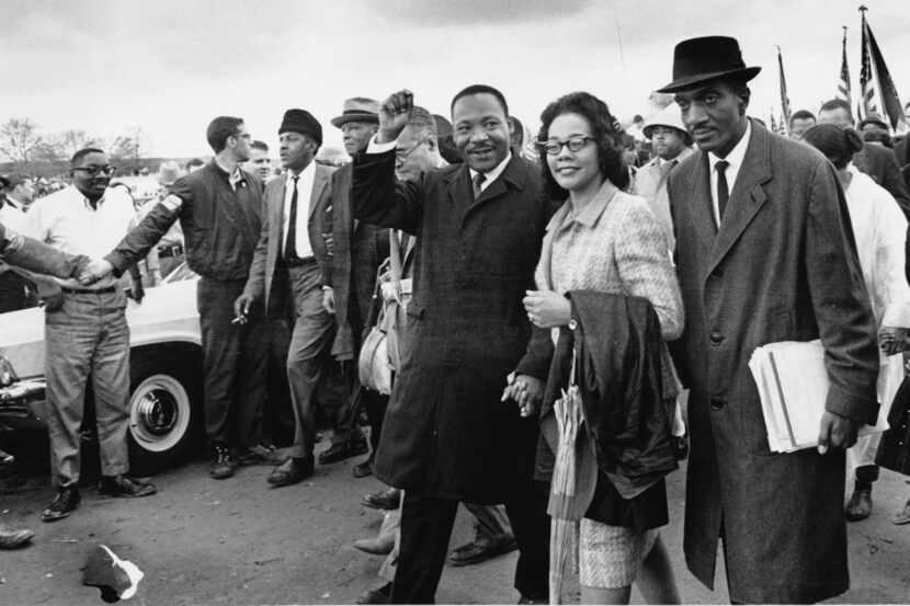 Dr. Martin Luther King Jr., third from right and his wife, Coretta Scott King, lead off the...