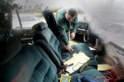  Wires are strewn about Glenn Billingsley's Grand Marquis, which he must hot-wire because it...