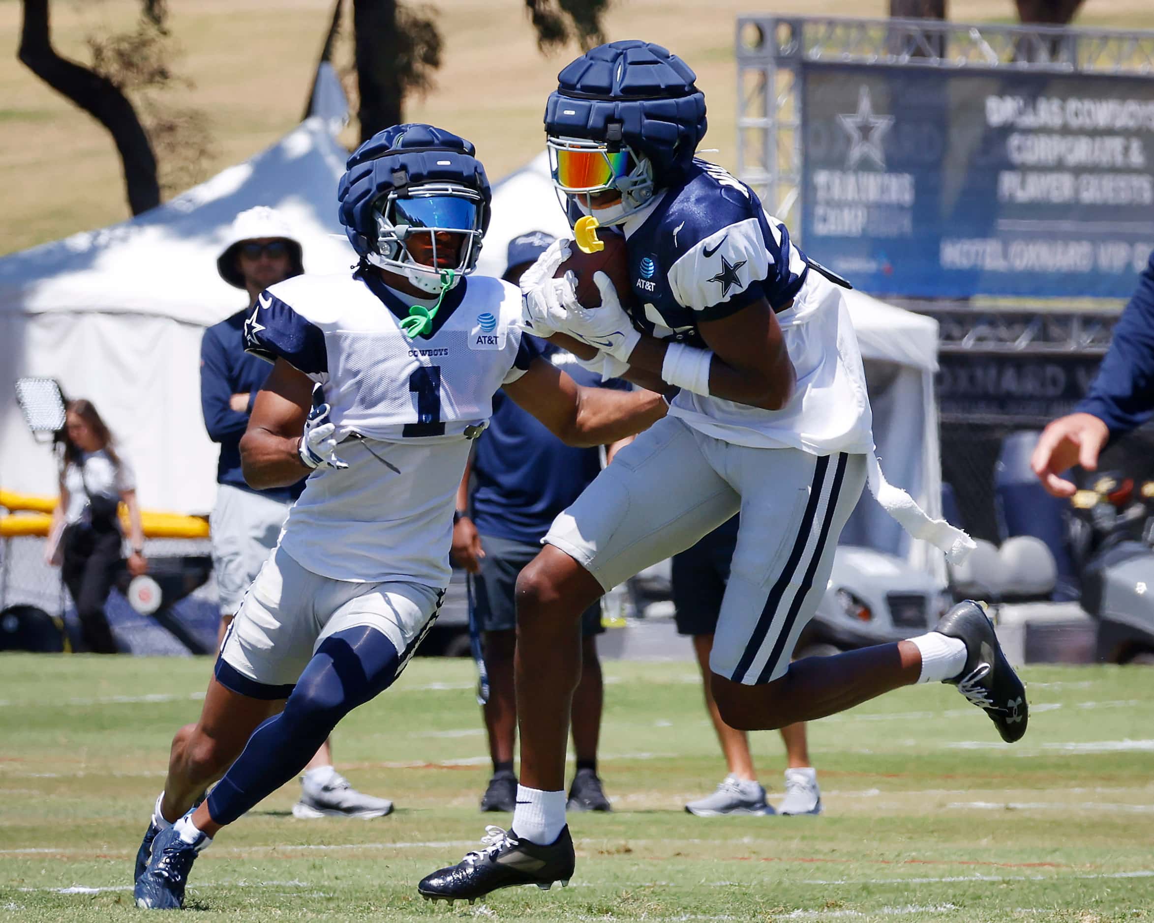 Dallas Cowboys safety Israel Mukuamu (24) steps in front of wide receiver Jalen Tolbert (1)...