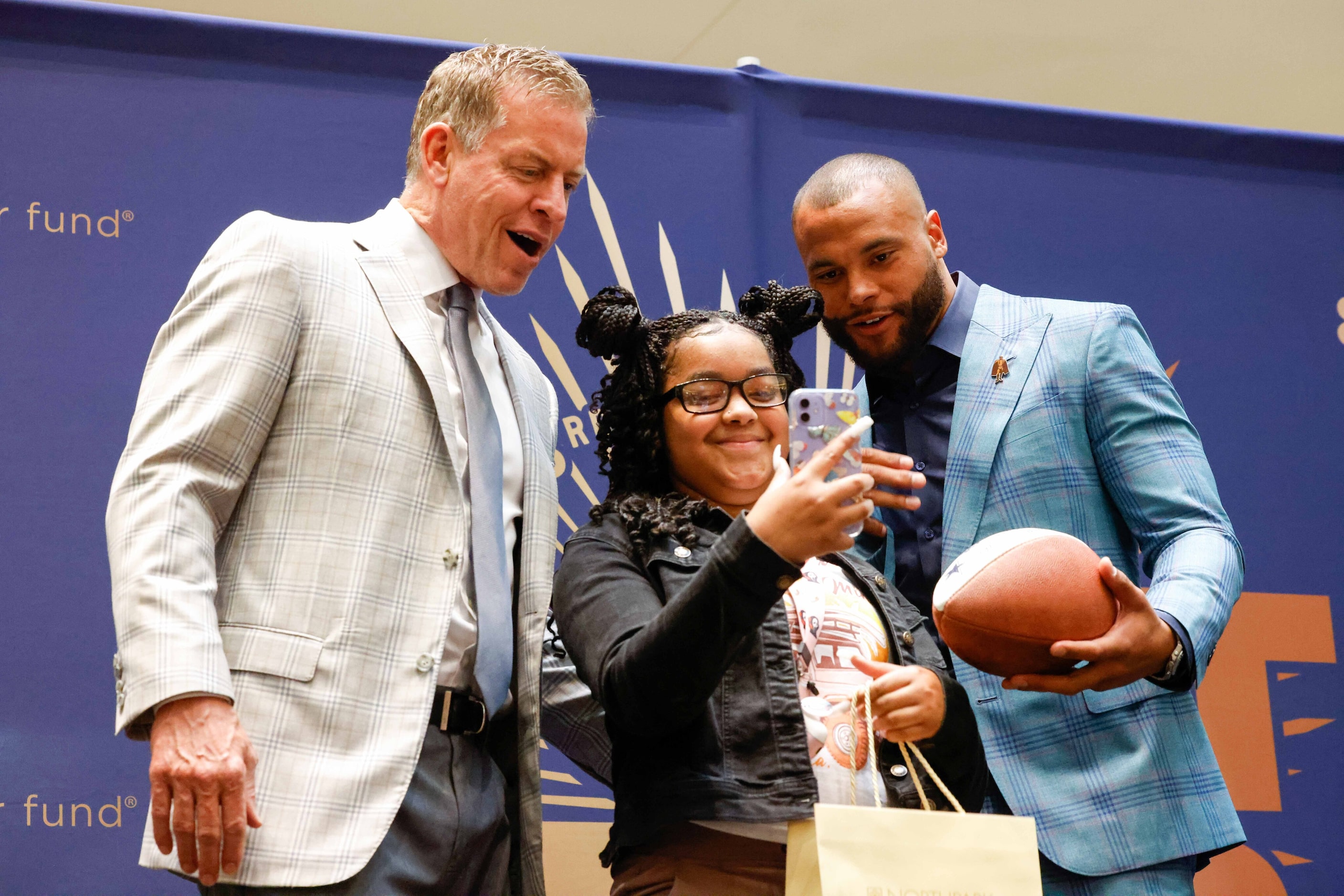 Dallas Cowboys Troy Aikman and Dak Prescott introduce Monique Hardin as a model for the...