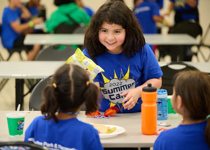 Children talking in a cafeteria