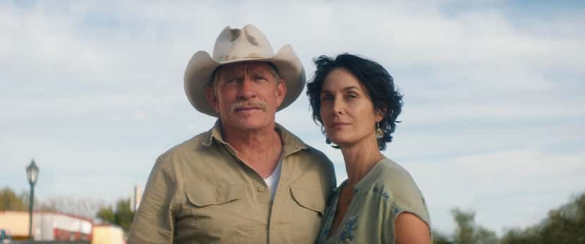 Thomas Haden Church and Carrie-Anne Moss appear in a scene from "Accidental Texan."