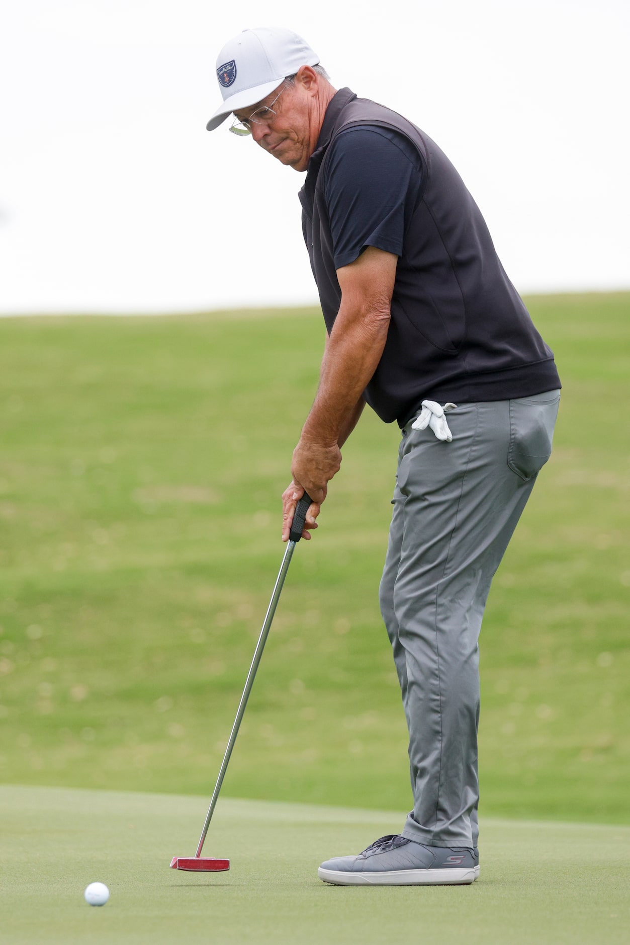 Former MLB pitcher Greg Maddux putts on the 9th green during the first round of the Invited...