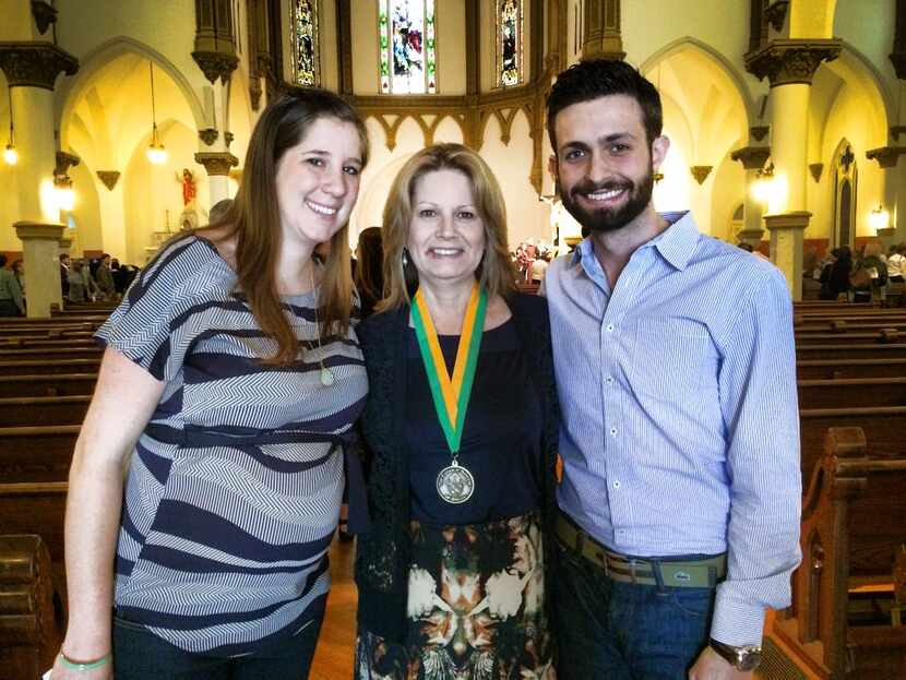 Brenda Hagan, center, of Holy Family in Irving, received a Bishop's Award from the Dallas...