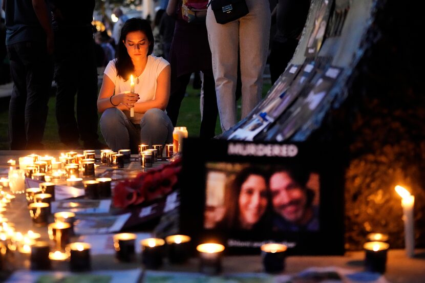 People light candles during the 'Jewish Community Vigil' for Israel in London, Monday, Oct....