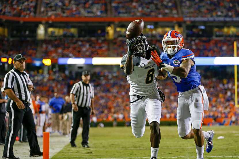 GAINESVILLE, FL - OCTOBER 18: Darius White #8 of the Missouri Tigers cannot complete a catch...