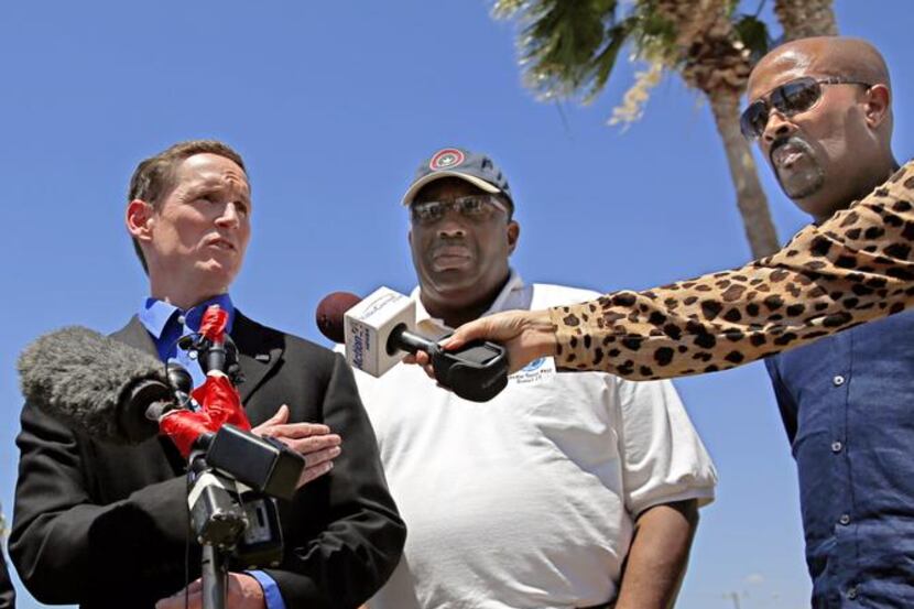
(From left) Dallas County Judge Clay Jenkins, State Sen. Royce West and Rev. Frederick D....