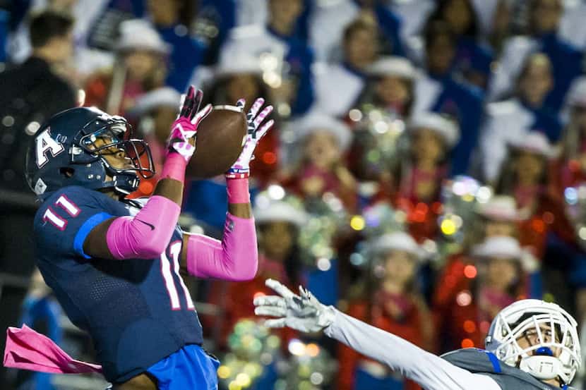 Allen wide receiver Lionell McConnell (11) catches a 42-yard  touchdown pass from...