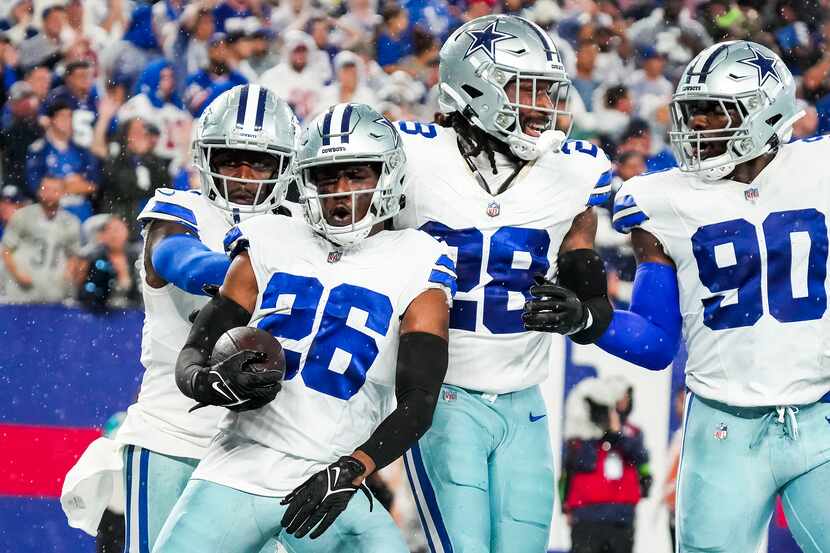 Dallas Cowboys cornerback DaRon Bland (26) celebrates after returning an interception for a...