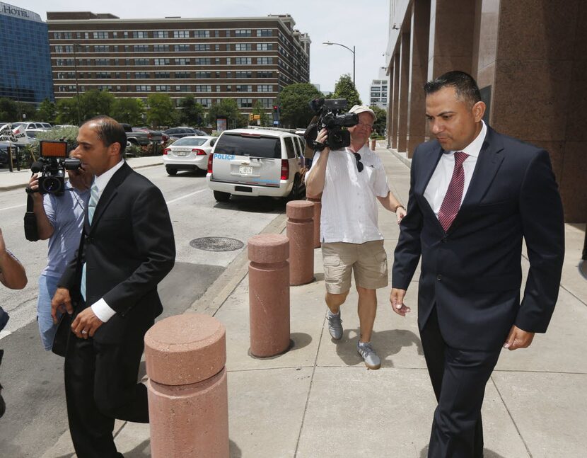 Christian Campbell (right) leaves the federal courthouse in Dallas in 2015 after agreeing to...