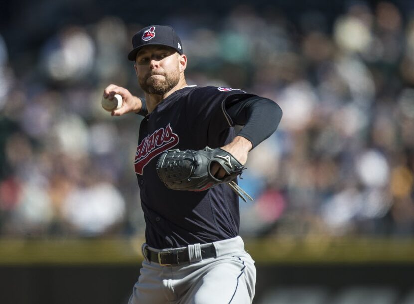 SEATTLE, WA - SEPTEMBER 24: Starter Corey Kluber #28 of the Cleveland Indians delivers a...