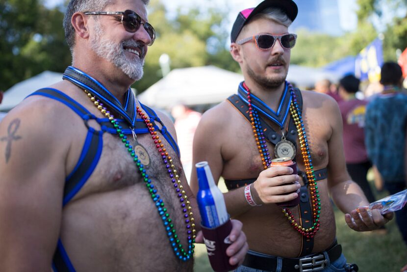 JayJay McCormick (left) and Ty Larson wore harnesses and medals as this year's Mr. Bear and...