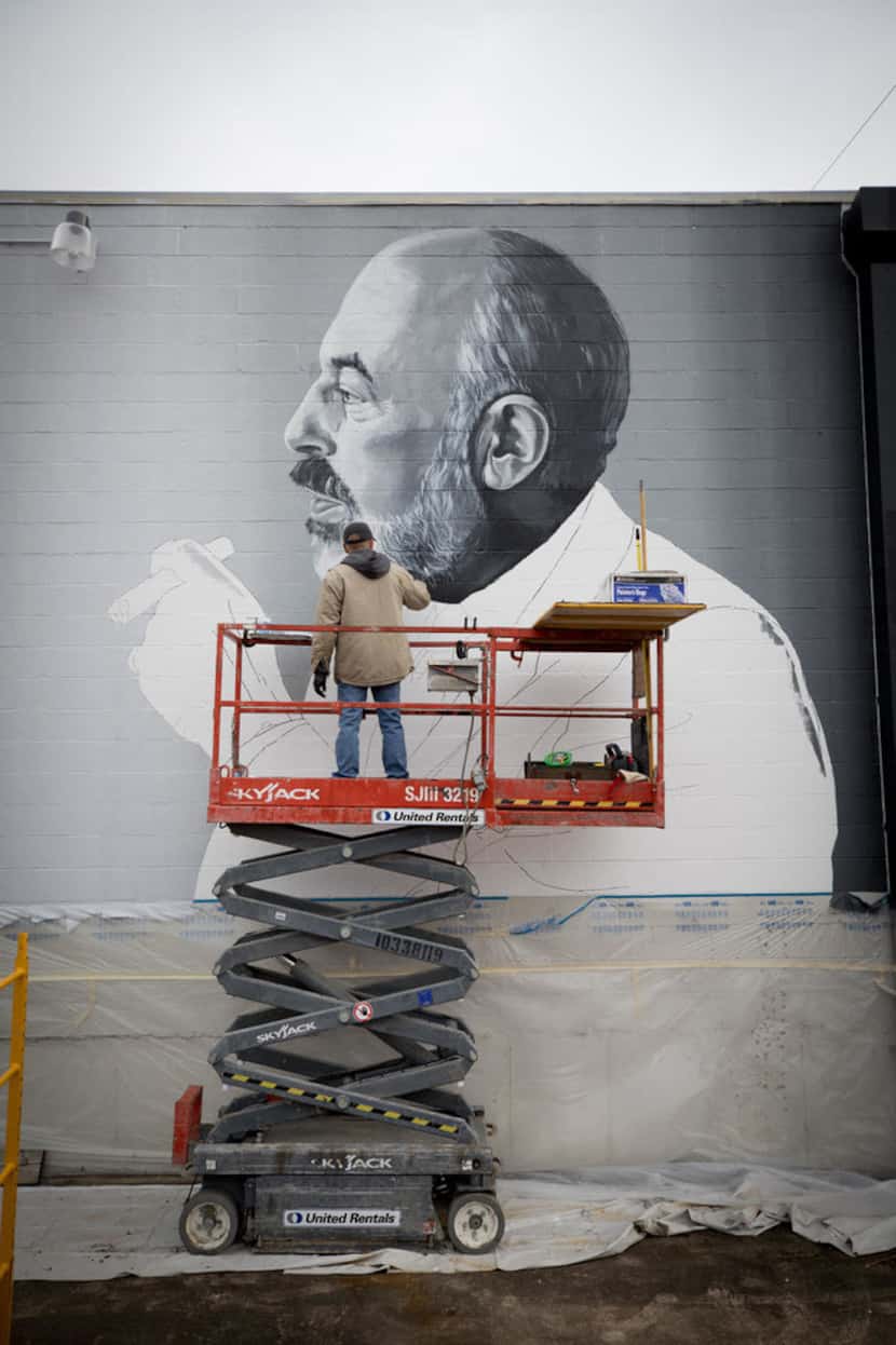 This mural of Neiman Marcus retail legend Stanley Marcus was commissioned by Shannon Wynne....