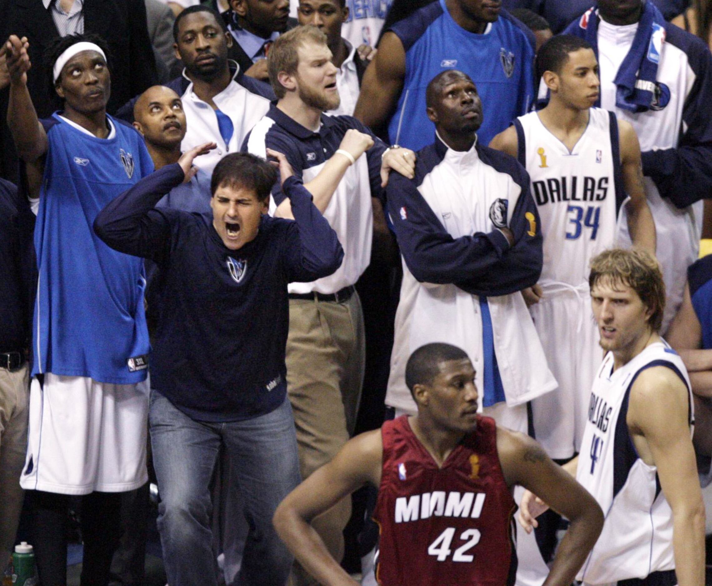 June 21, 2006: The Mavericks bench and owner Mark Cuban react to a late call in Game 6 of...