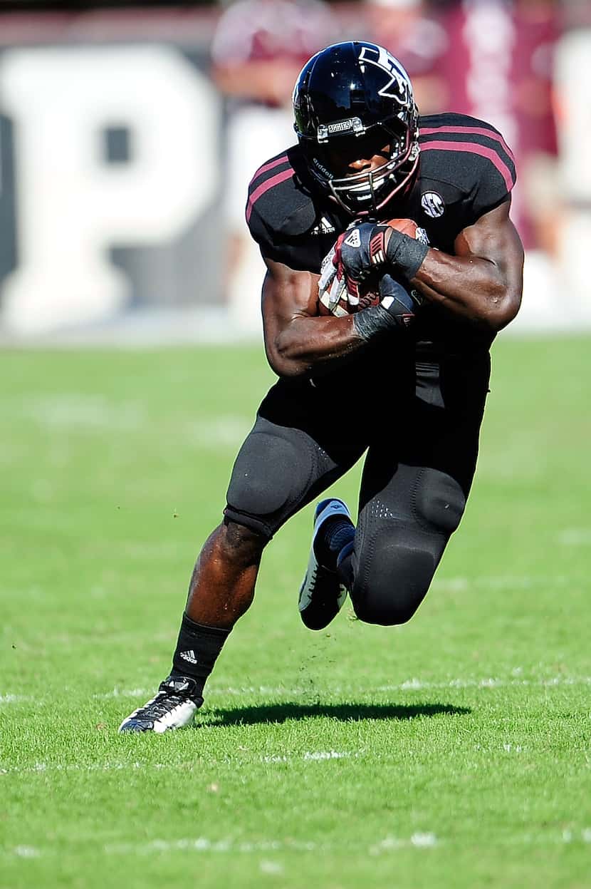 STARKVILLE, MS - NOVEMBER 03:  Christine Michael #33 of the Texas A&M Aggies runs for yards...