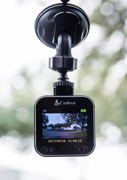 A video camera that delivery driver Derek Grippin mounts on the windshield of his delivery...