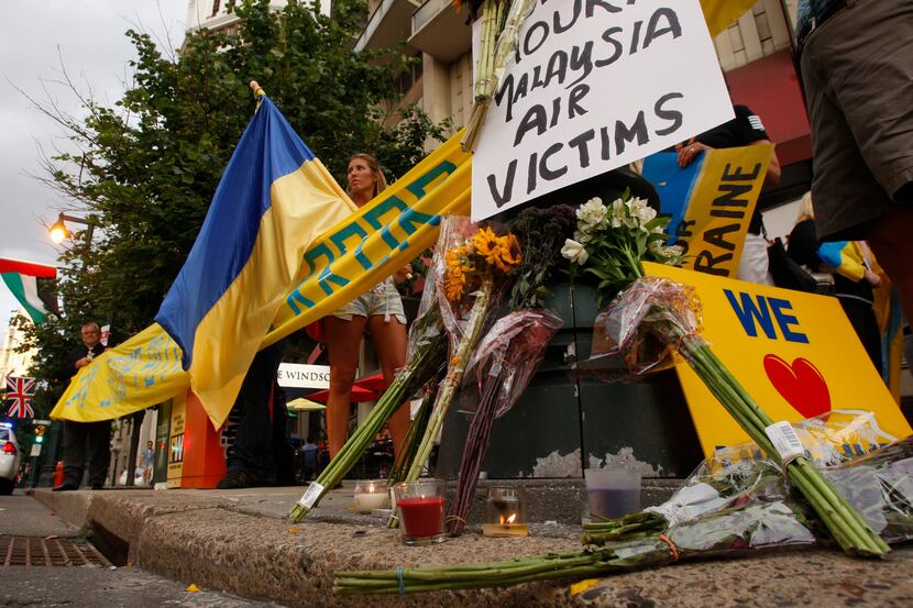 Ukrainians in Philadelphia gather Friday, July 18, 2014, on The Parkway for a vigil...