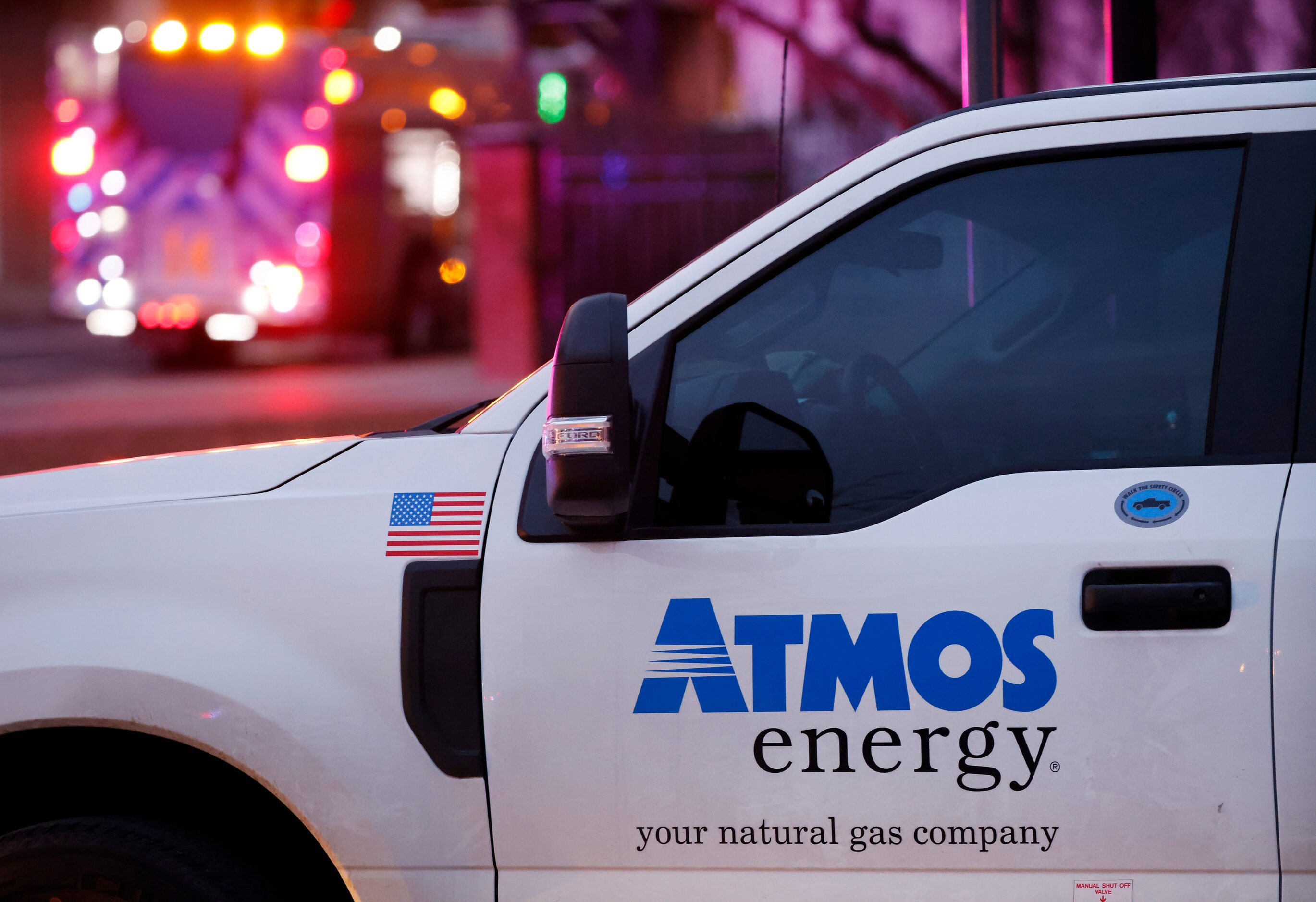 An Atmos Energy truck parked at the site where an explosion occurred at the Sandman...