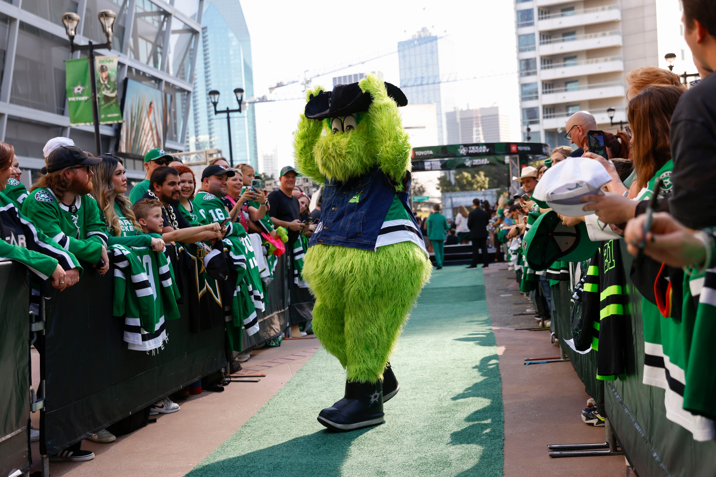 Dallas Stars mascot Victor E. Green entertain the crowd as they wait for the players entry...