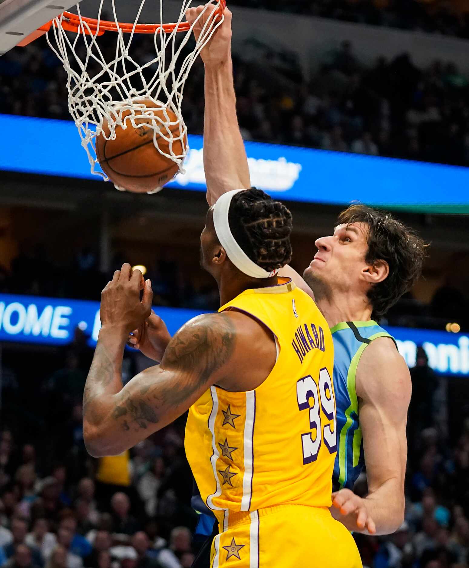 Dallas Mavericks center Boban Marjanovic (51) dunks the ball as Los Angeles Lakers center...