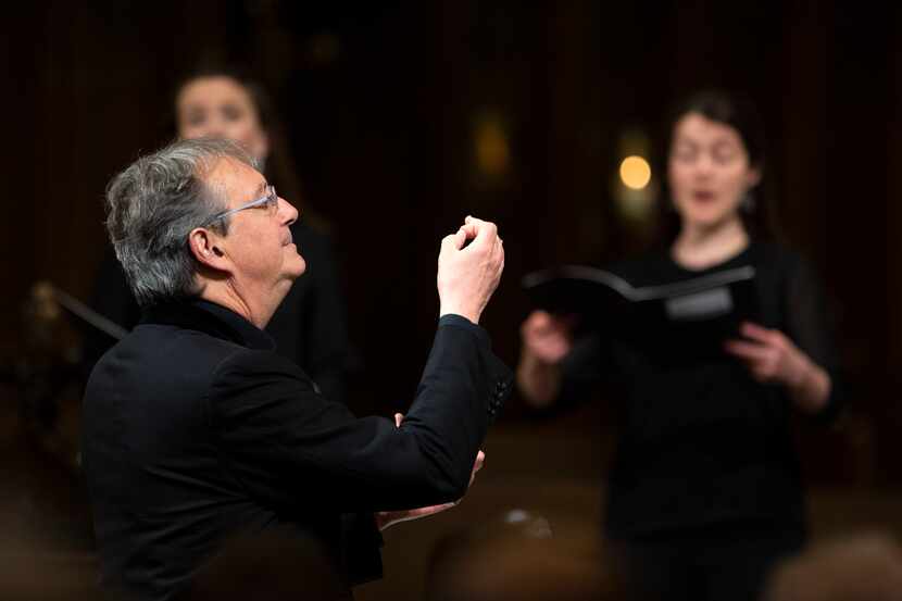 The Tallis Scholars director Peter Phillips conducts the choral ensemble during the...